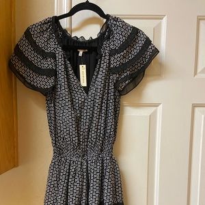 Black/white dress - 37 inches shoulder to bottom, stretch waist. 100% polyester.